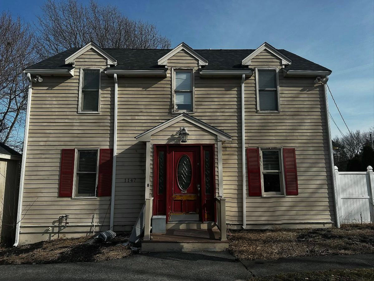 Front of the house before its exterior re-side